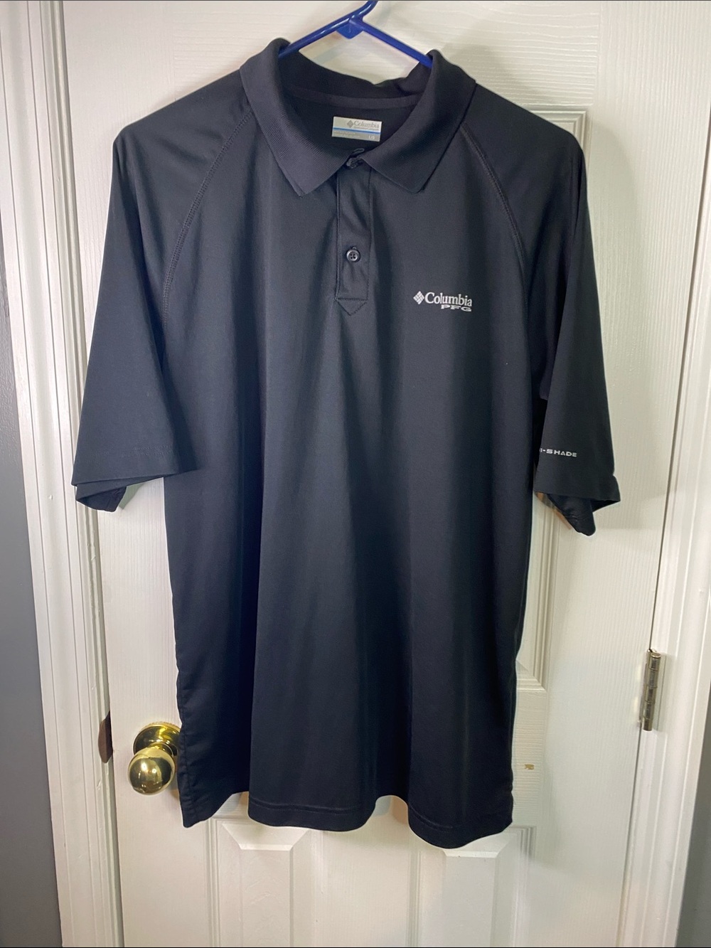 Columbia Men's Black Short-Sleeve Performance Polo Size Large.
